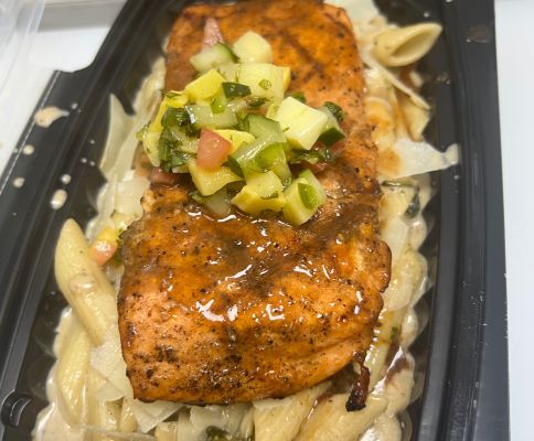 Savor a hearty meal with fried plantains, cheese, and grilled vegetables. Perfect for a vibrant lunch.